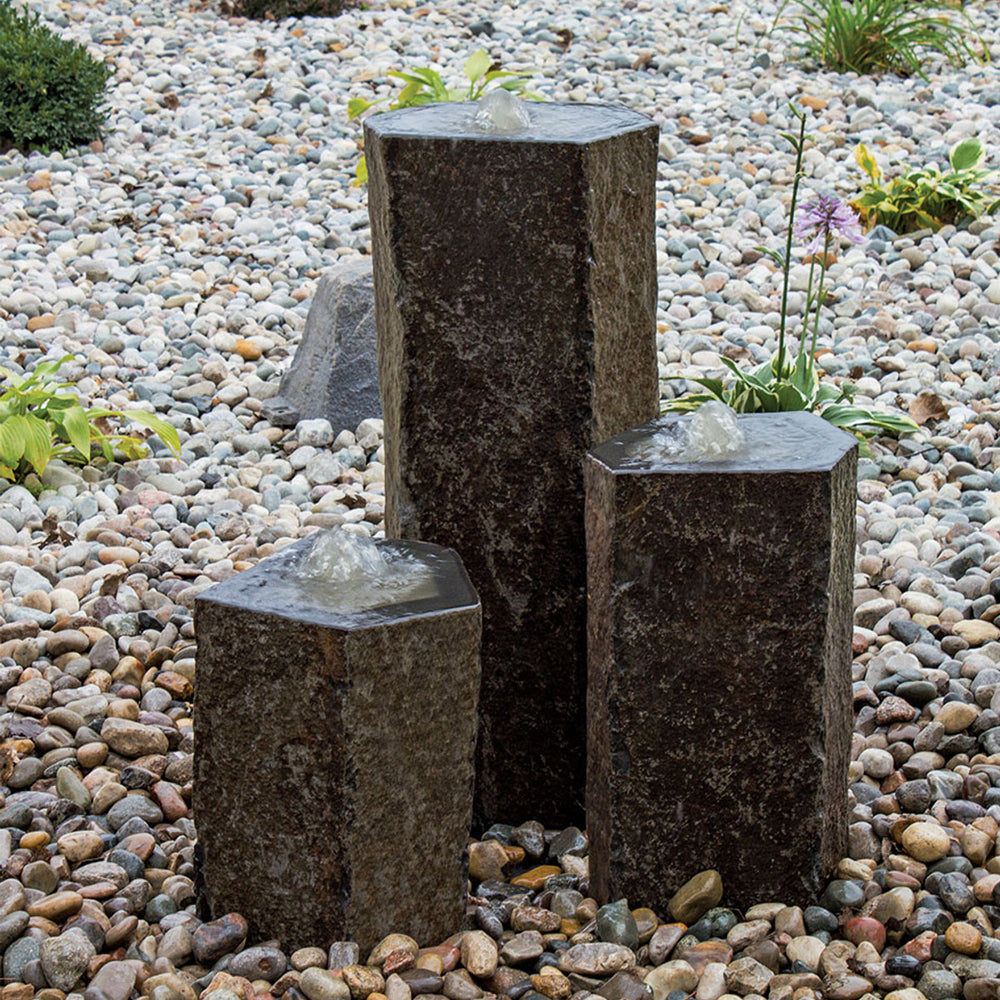 Hollowed-Out Basalt Column Outdoor Fountain - Outdoor Fountain Pros