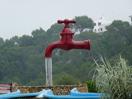 The Cheeky Tap Fountain in Menorca, Spain