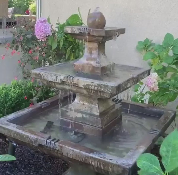 Tall Equinox Fountain in a modern outdoor courtyard